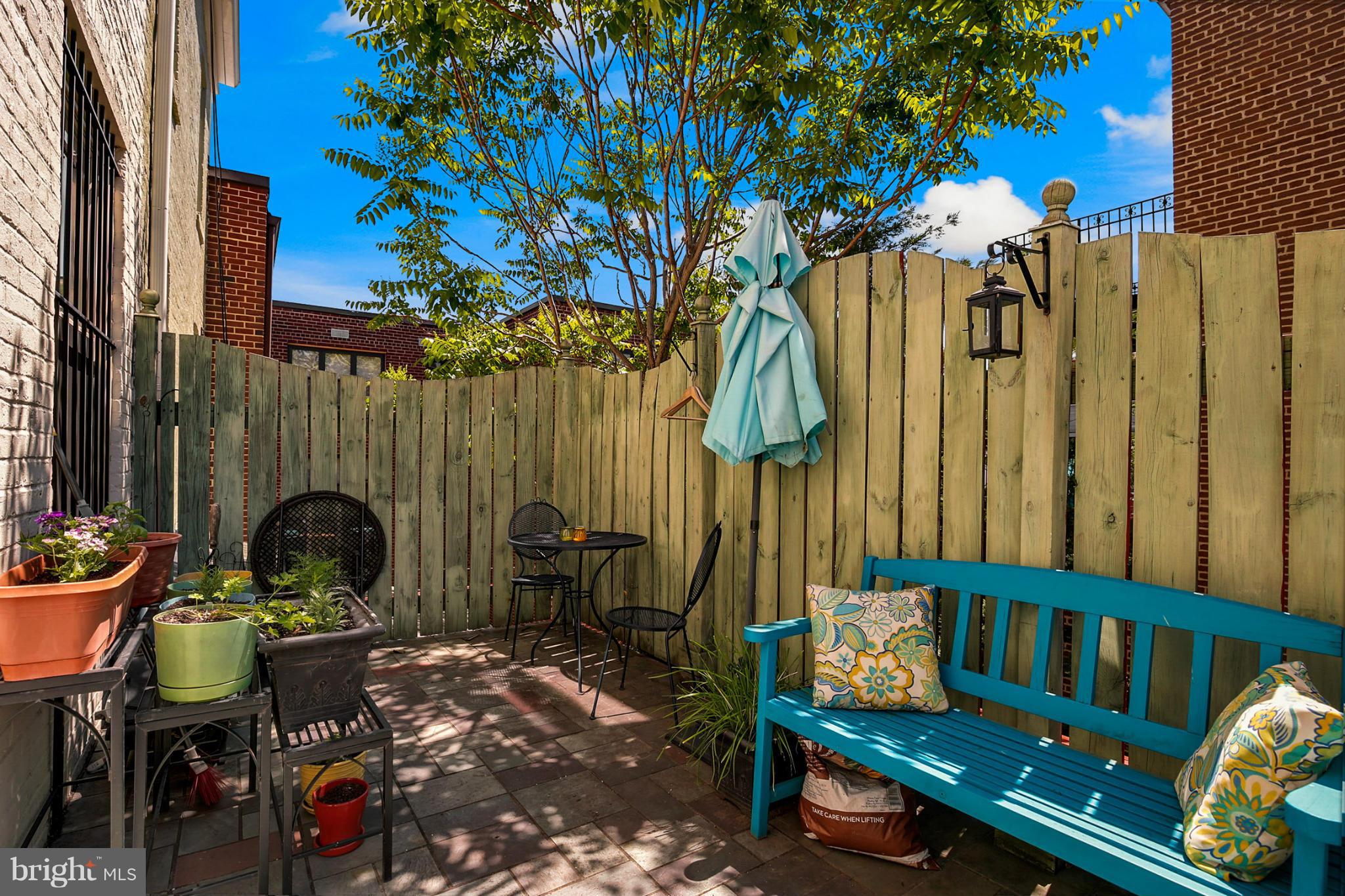 1454 Euclid Street Northwest, Unit 7 Washington, DC 20009 - Photo 22 of 23 an outdoor sitting area with chairs