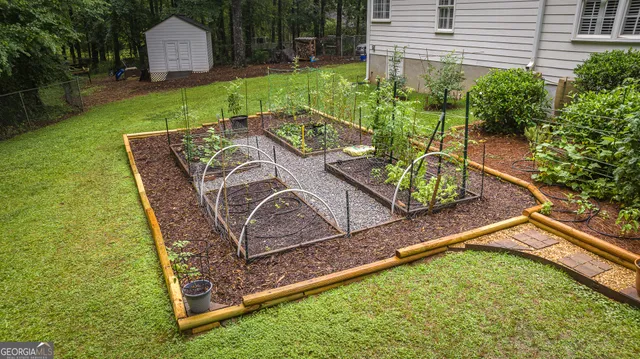 a view of a backyard with a garden