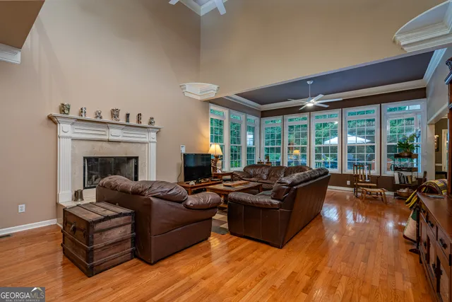 a living room with furniture and windows