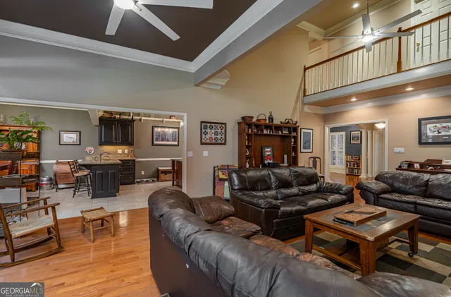 a view of a dining room with furniture and window