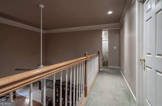 a bathroom with a granite countertop sink a mirror and shower