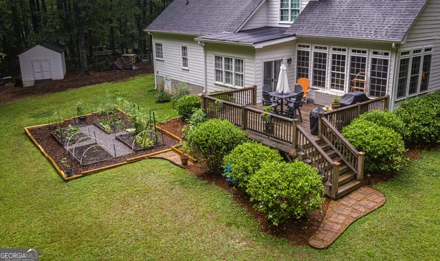 a house with garden in front of it