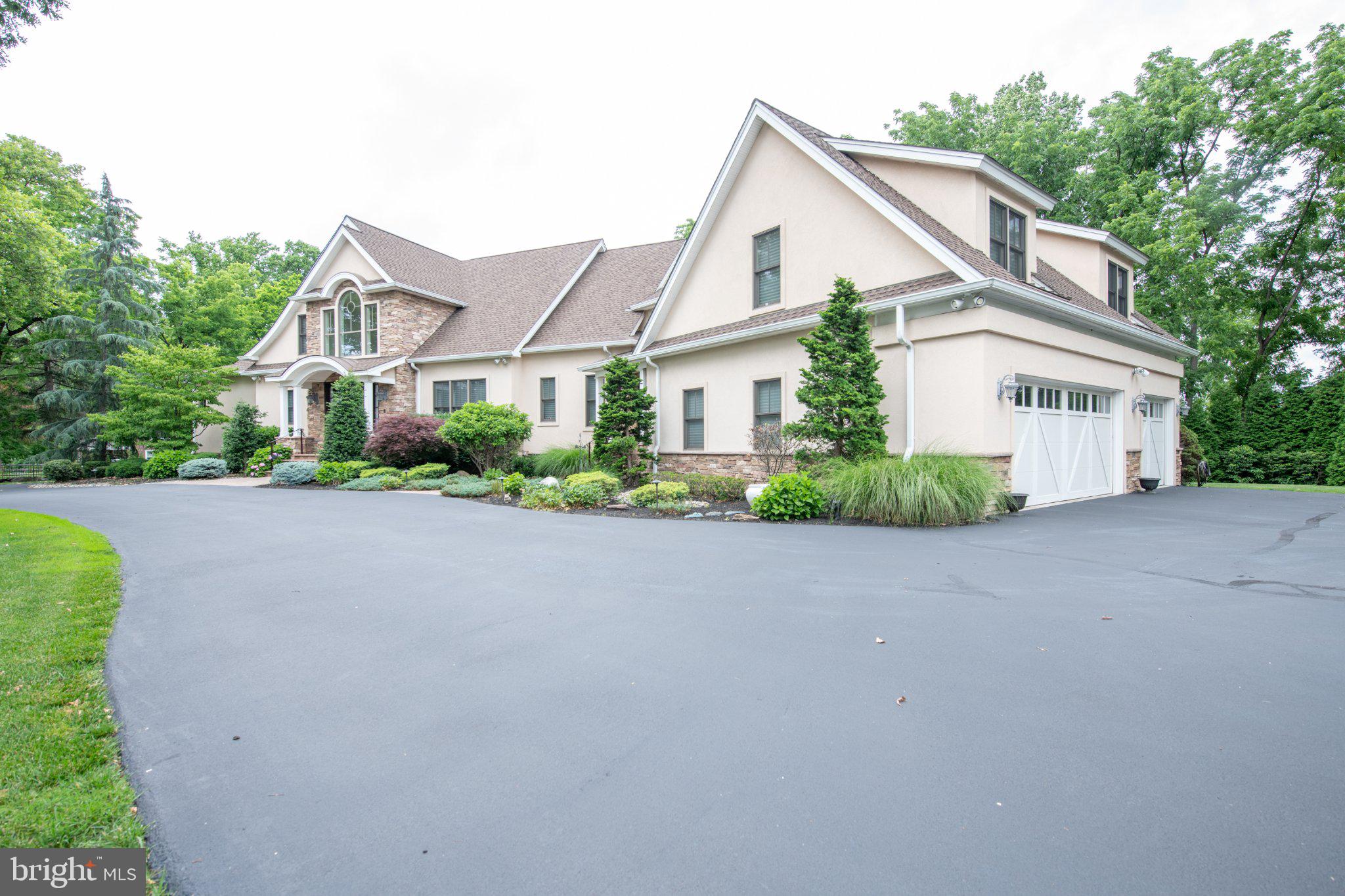 711 Moredon Road Jenkintown, PA 19046 - Photo 31 of 140 Elegant home with lush landscaping.
