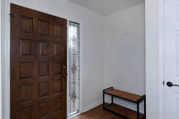 a view of a hallway with closet