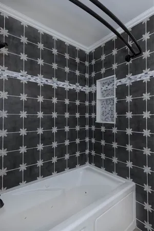 a view of a bathtub in a bathroom