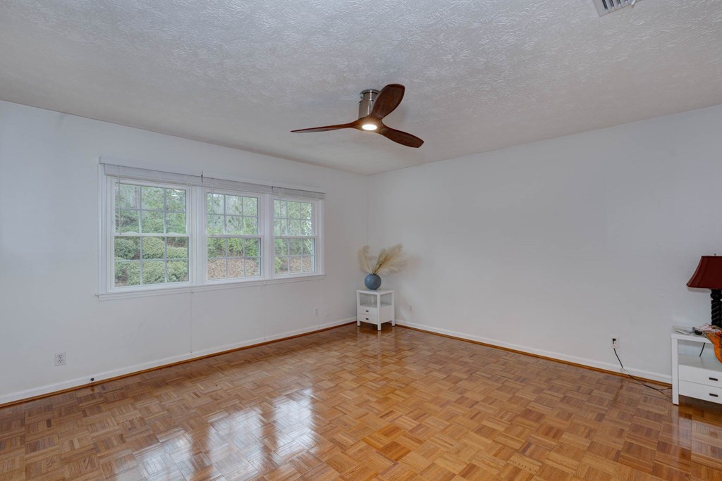 6101 River Road, Unit 5 Columbus, GA 31904 - Photo 30 of 47 a view of a livingroom with a ceiling fan and window