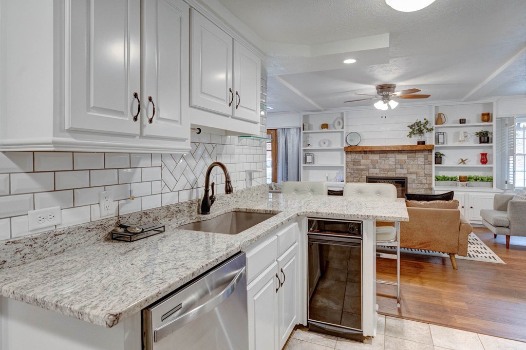 6101 River Road, Unit 5 Columbus, GA 31904 - Photo 3 of 47 a kitchen with stainless steel appliances granite countertop a sink stove and cabinets