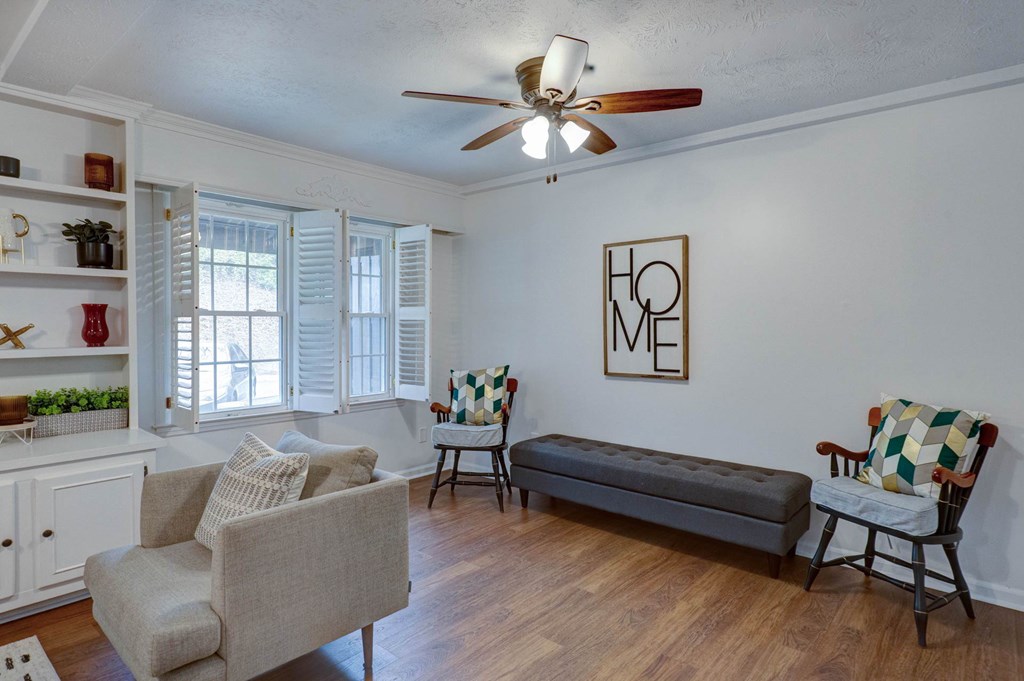 6101 River Road, Unit 5 Columbus, GA 31904 - Photo 36 of 47 a living room with furniture and a large window