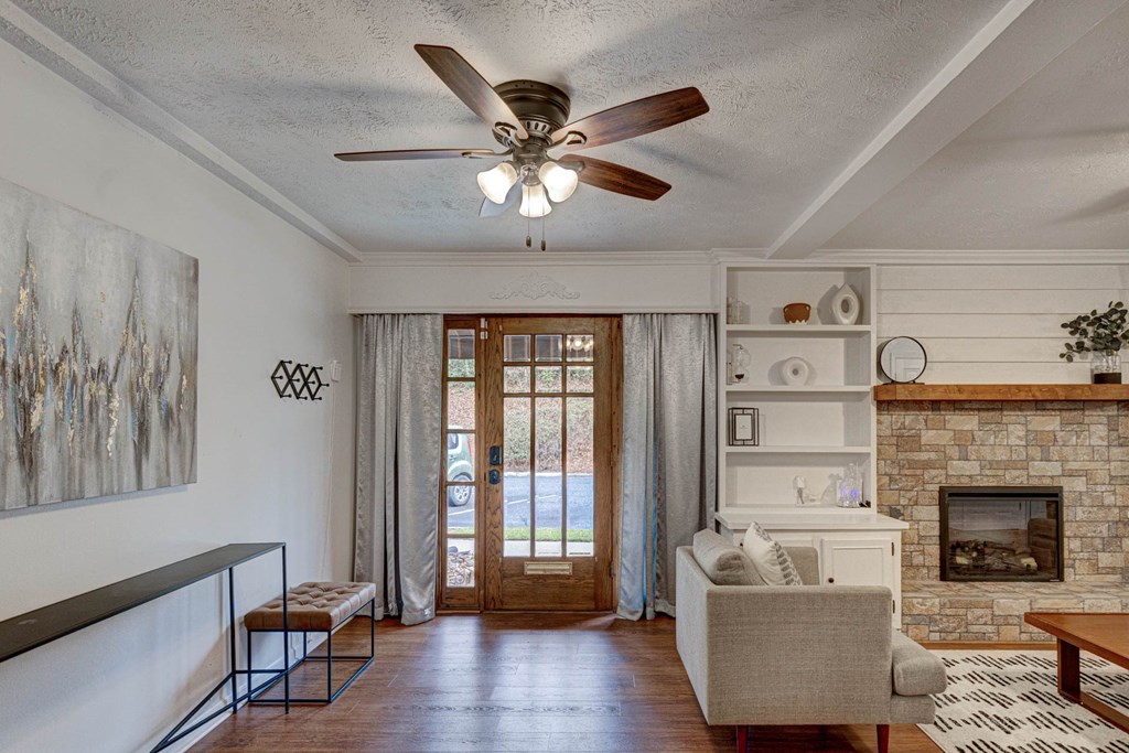 6101 River Road, Unit 5 Columbus, GA 31904 - Photo 4 of 47 a living room with furniture and a fireplace
