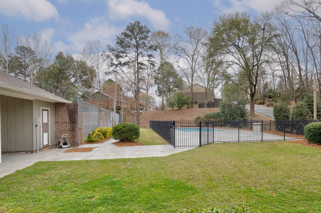 6101 River Road, Unit 5 Columbus, GA 31904 - Photo 44 of 47 a view of house with backyard and a tree
