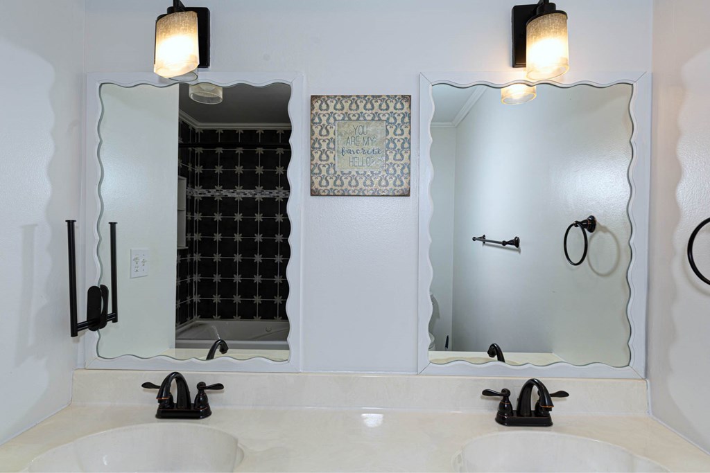 6101 River Road, Unit 5 Columbus, GA 31904 - Photo 10 of 47 a bathroom with a sink and a mirror