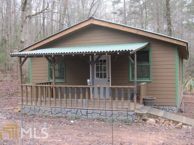 579 Elford Road, Unit 18 Ellijay, GA 30536 - Photo 1 of 1 a front view of a house with garden