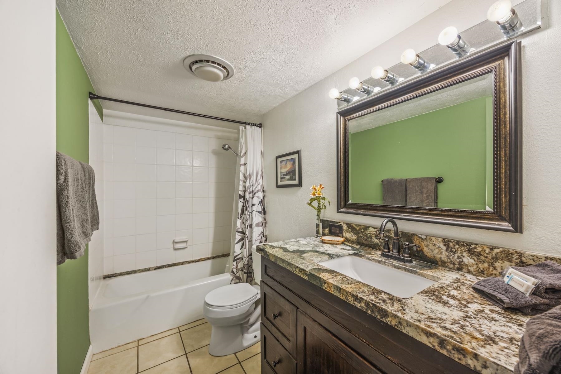 2495 South Kihei Road, Unit 171 Kihei, HI 96753 - Photo 9 of 18 a bathroom with a granite countertop sink toilet and mirror