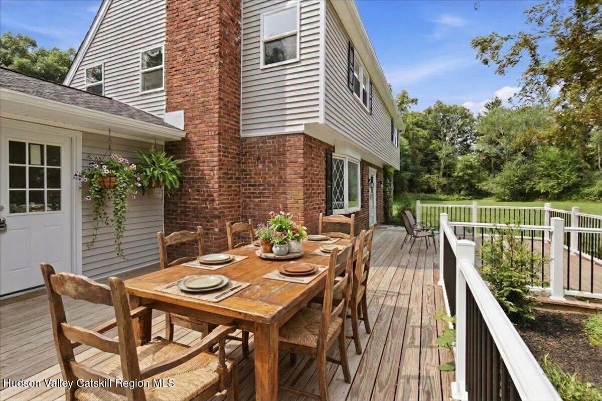 208 R. Mclaren Extension South Cairo, NY 12482 - Photo 43 of 48 43-10-Front Deck AI Staged