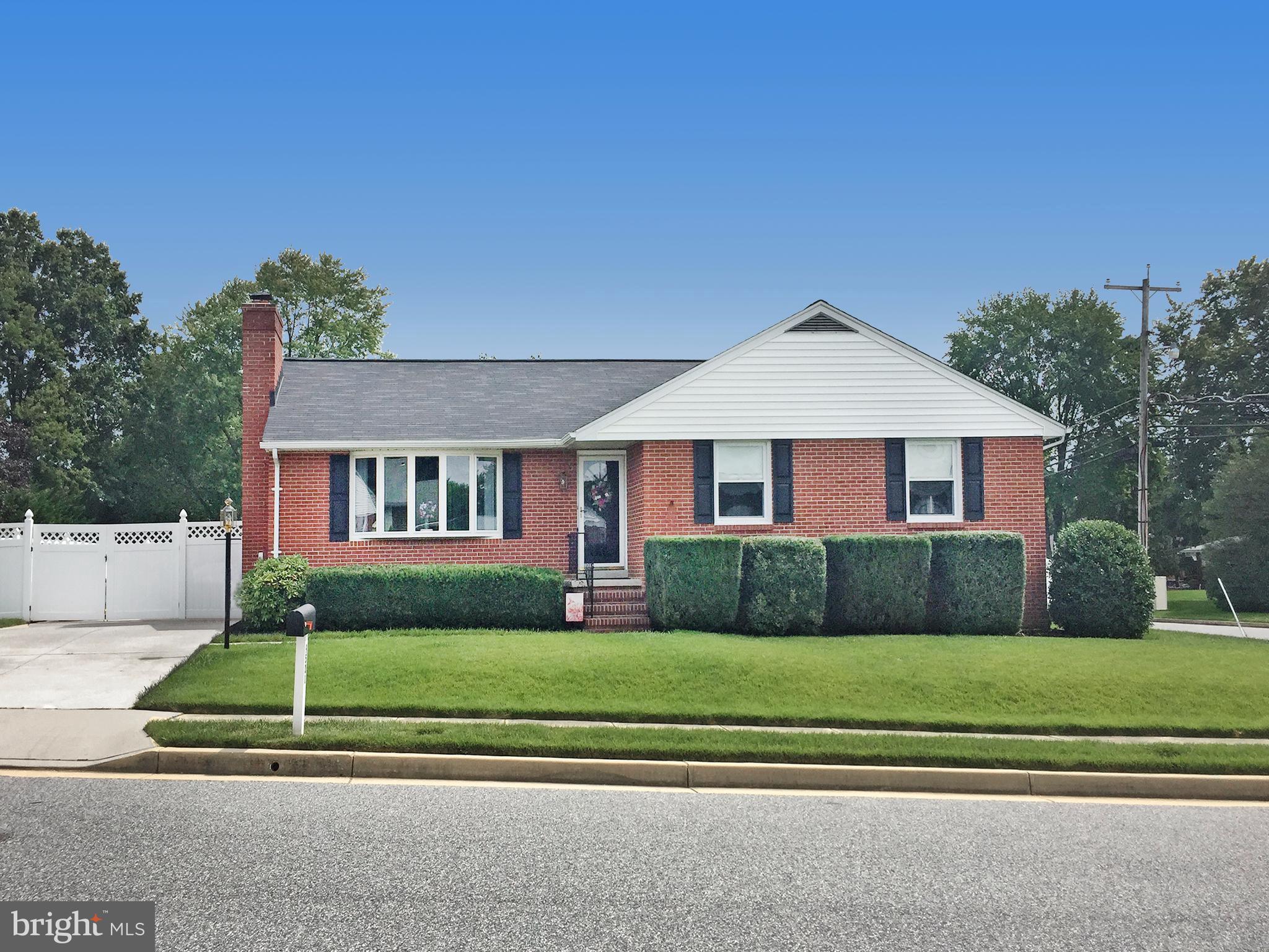 9501 Dawnvale Road Baltimore, MD 21236 - Photo 1 of 30 a front view of a house with a yard