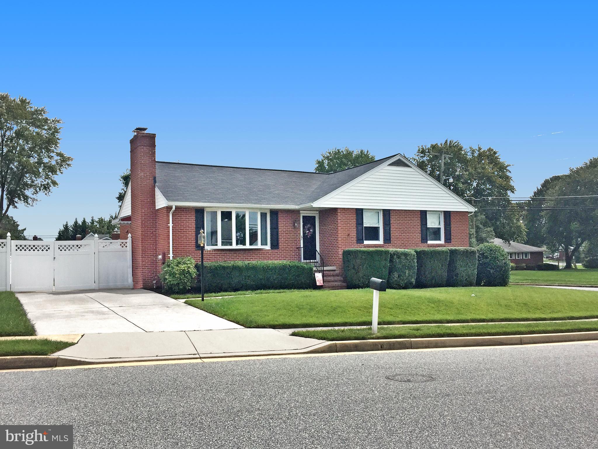 9501 Dawnvale Road Baltimore, MD 21236 - Photo 3 of 30 a front view of a house with a yard