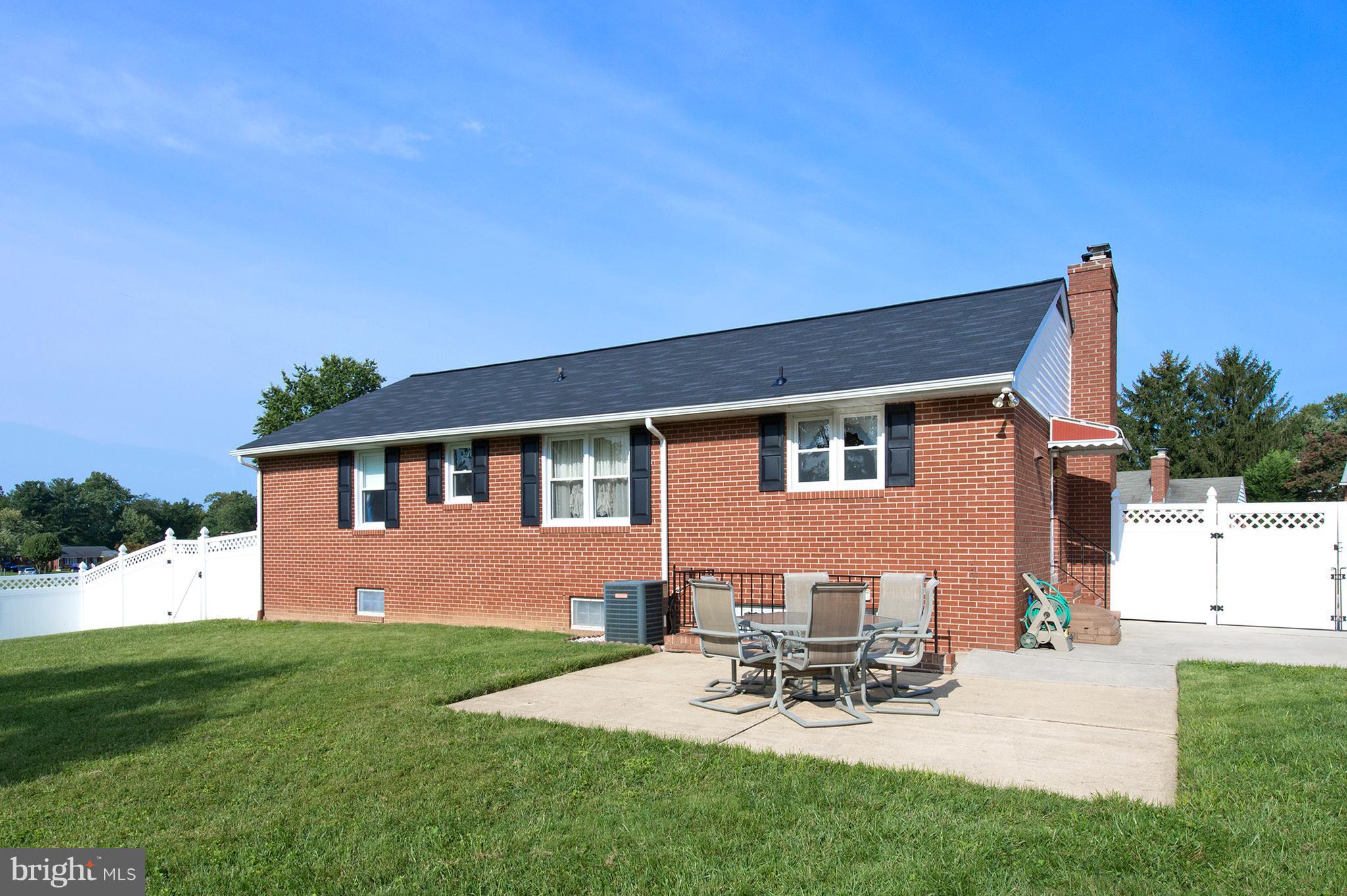 9501 Dawnvale Road Baltimore, MD 21236 - Photo 26 of 30 a view of a house with patio