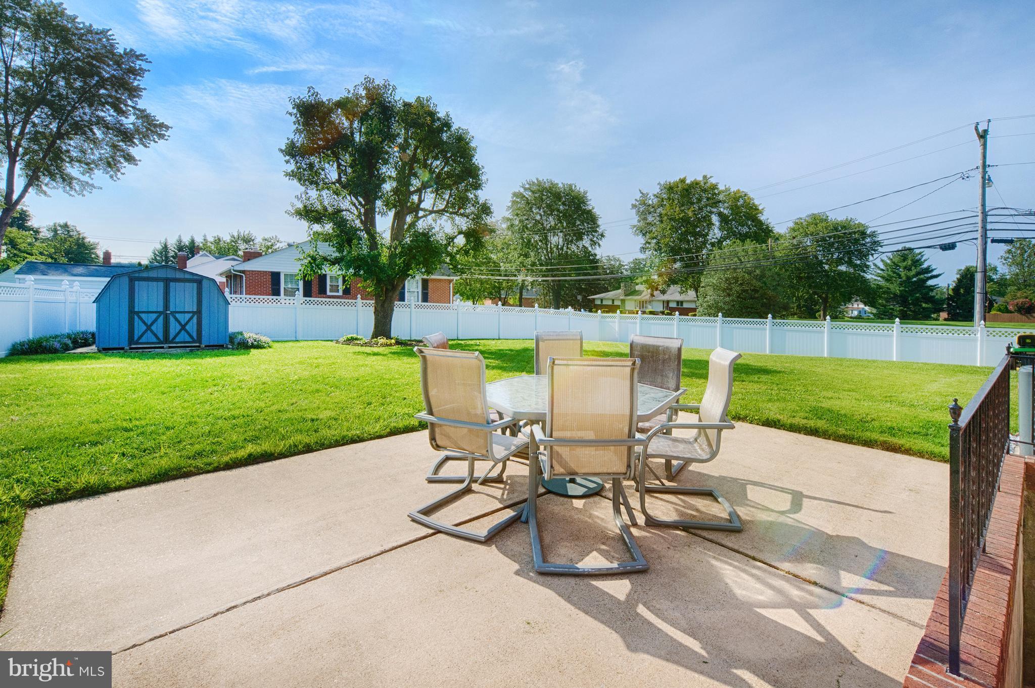 9501 Dawnvale Road Baltimore, MD 21236 - Photo 28 of 30 a view of a backyard with sitting area