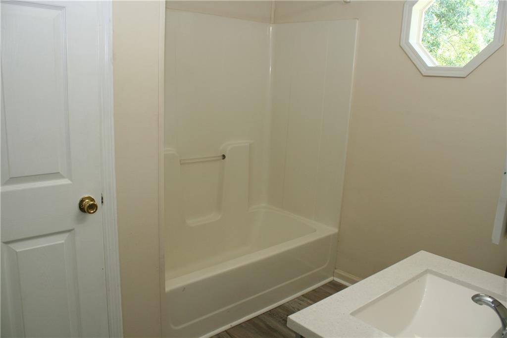 3735 South Seale Road Phenix City, AL 36869 - Photo 26 of 27 Bathroom 2 with LVP finished floors, shower combination, and vanity