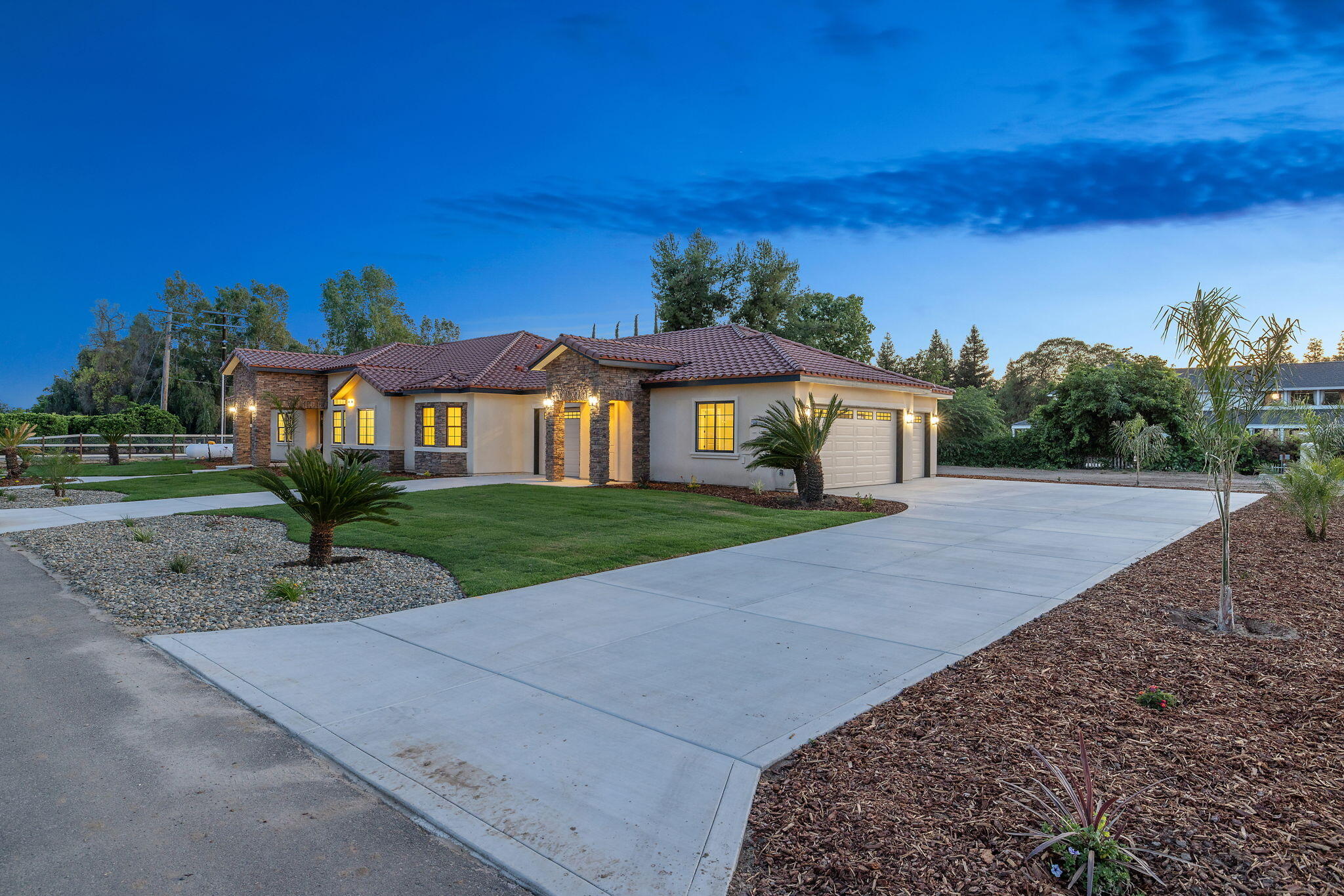 503 East Palm Street Exeter, CA 93221 - Photo 75 of 92 a front view of a house with a yard