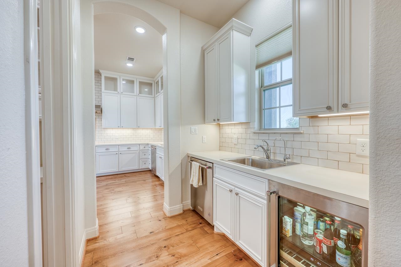 229 Eagle Ridge Burnet, TX 78611 - Photo 13 of 30 a kitchen with a sink cabinets and window