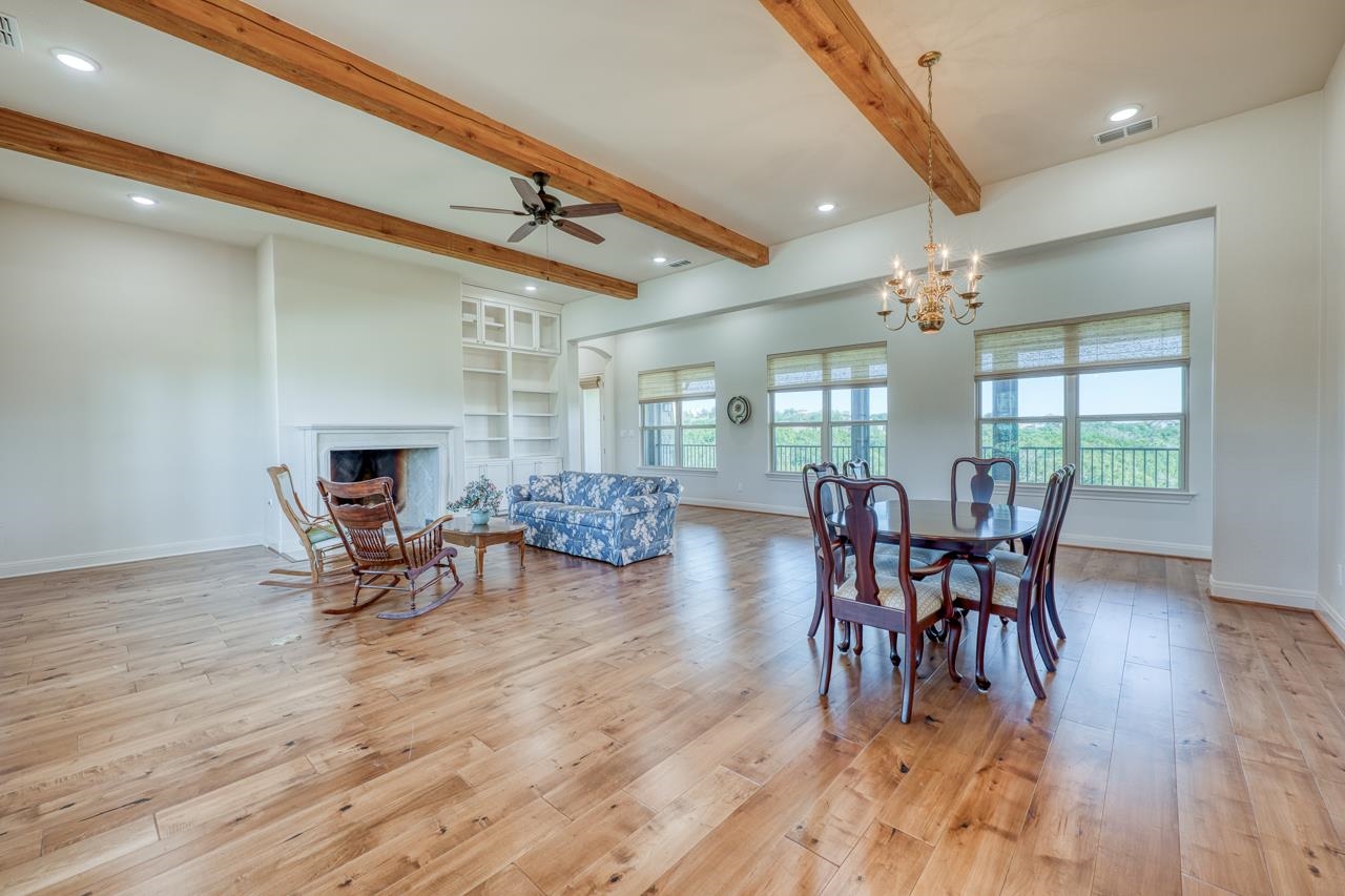 229 Eagle Ridge Burnet, TX 78611 - Photo 15 of 30 a dining room with furniture and wooden floor