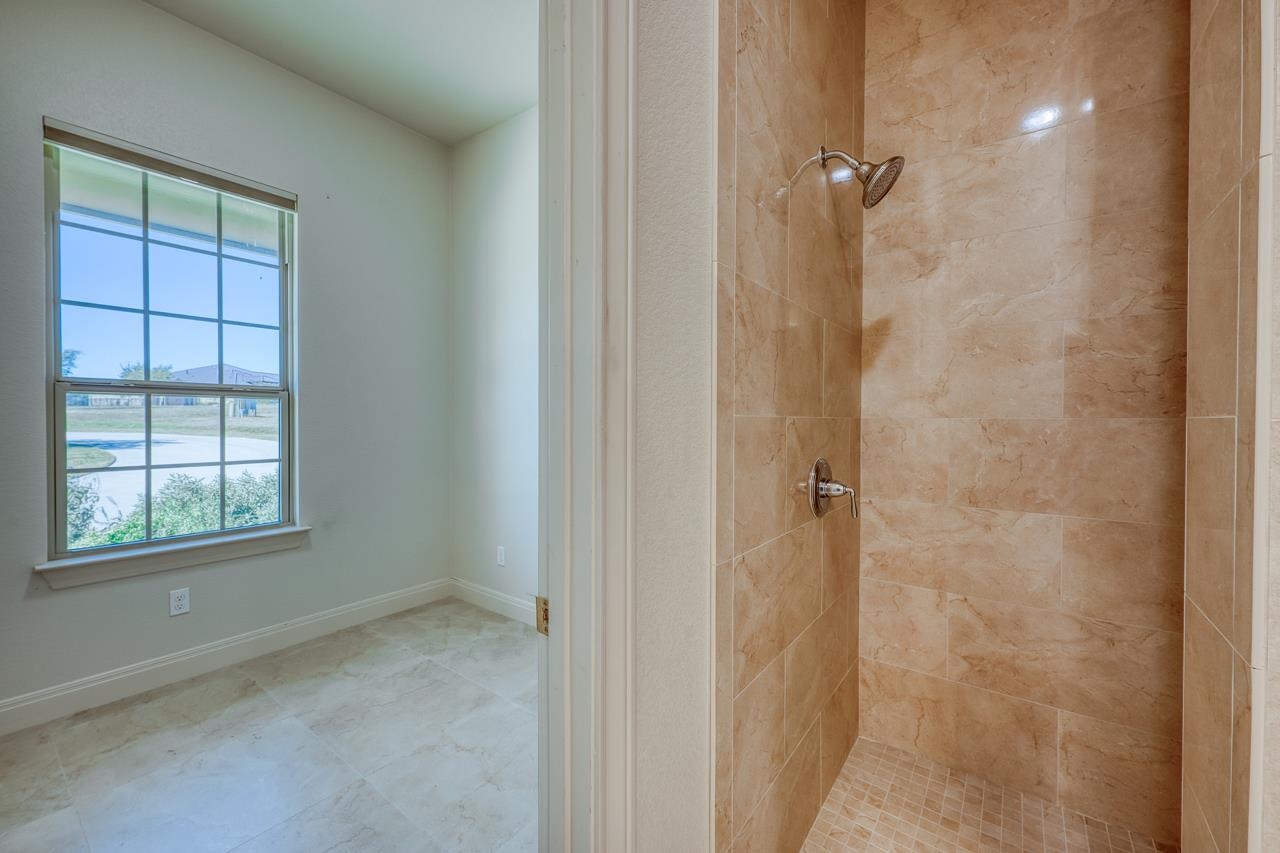 229 Eagle Ridge Burnet, TX 78611 - Photo 26 of 30 a view of an empty room with a window