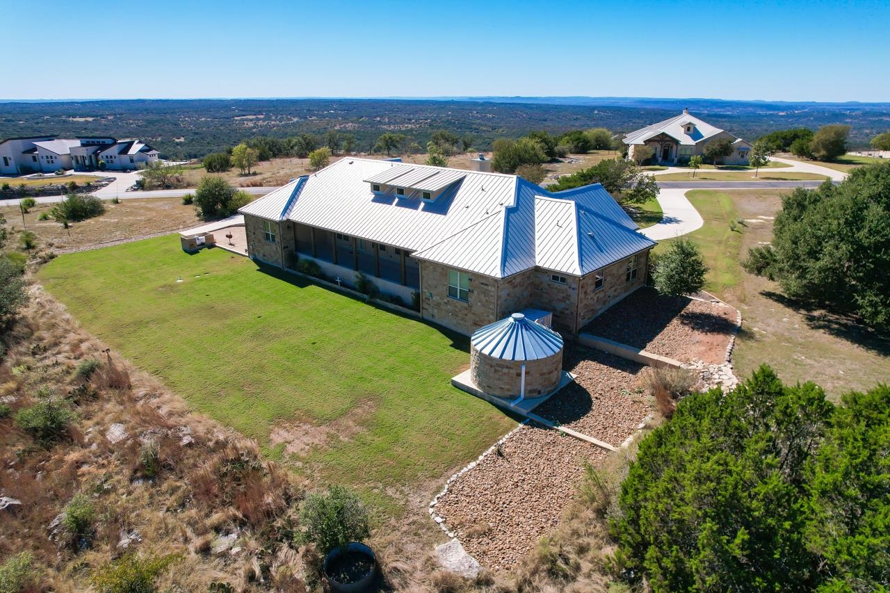 229 Eagle Ridge Burnet, TX 78611 - Photo 3 of 30 a view of a house with a yard and sitting area