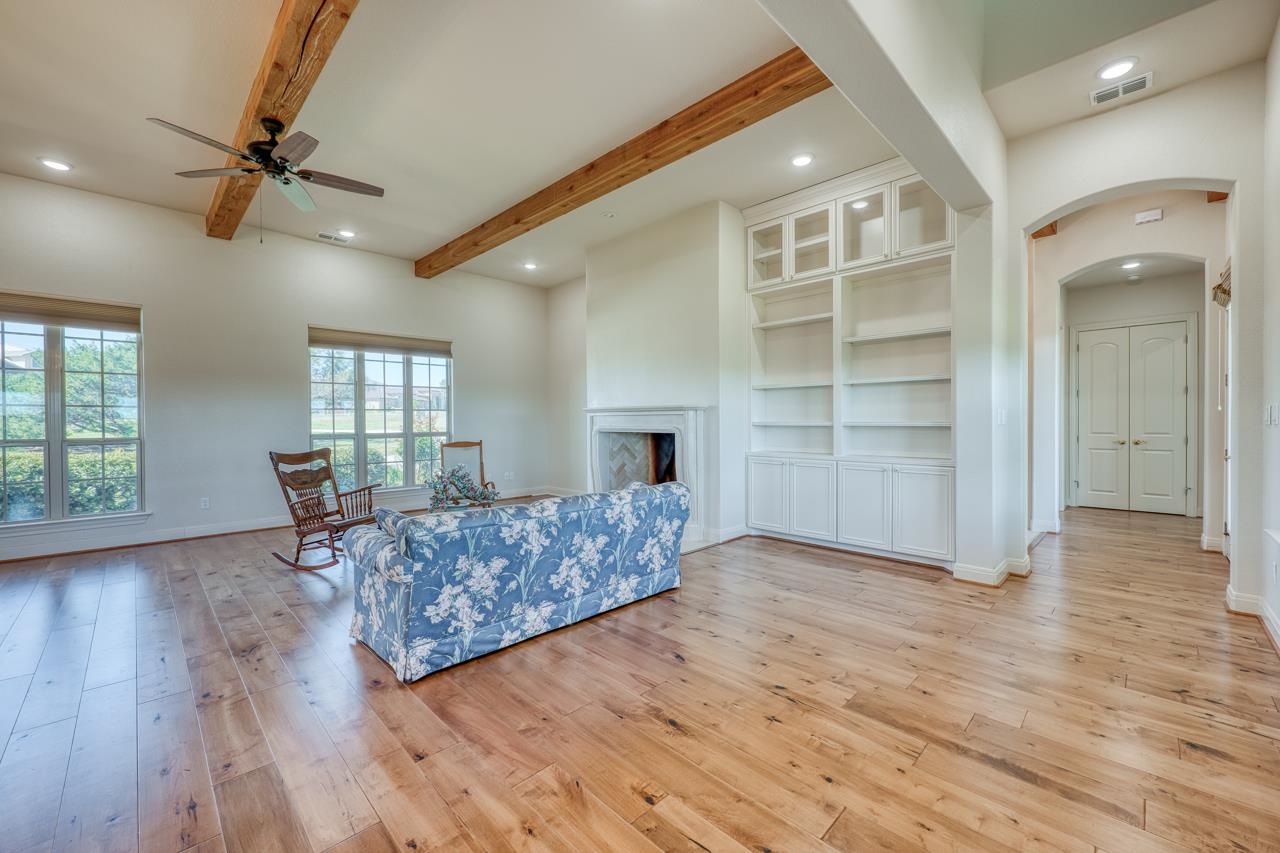 229 Eagle Ridge Burnet, TX 78611 - Photo 6 of 30 a living room with furniture and a wooden floor