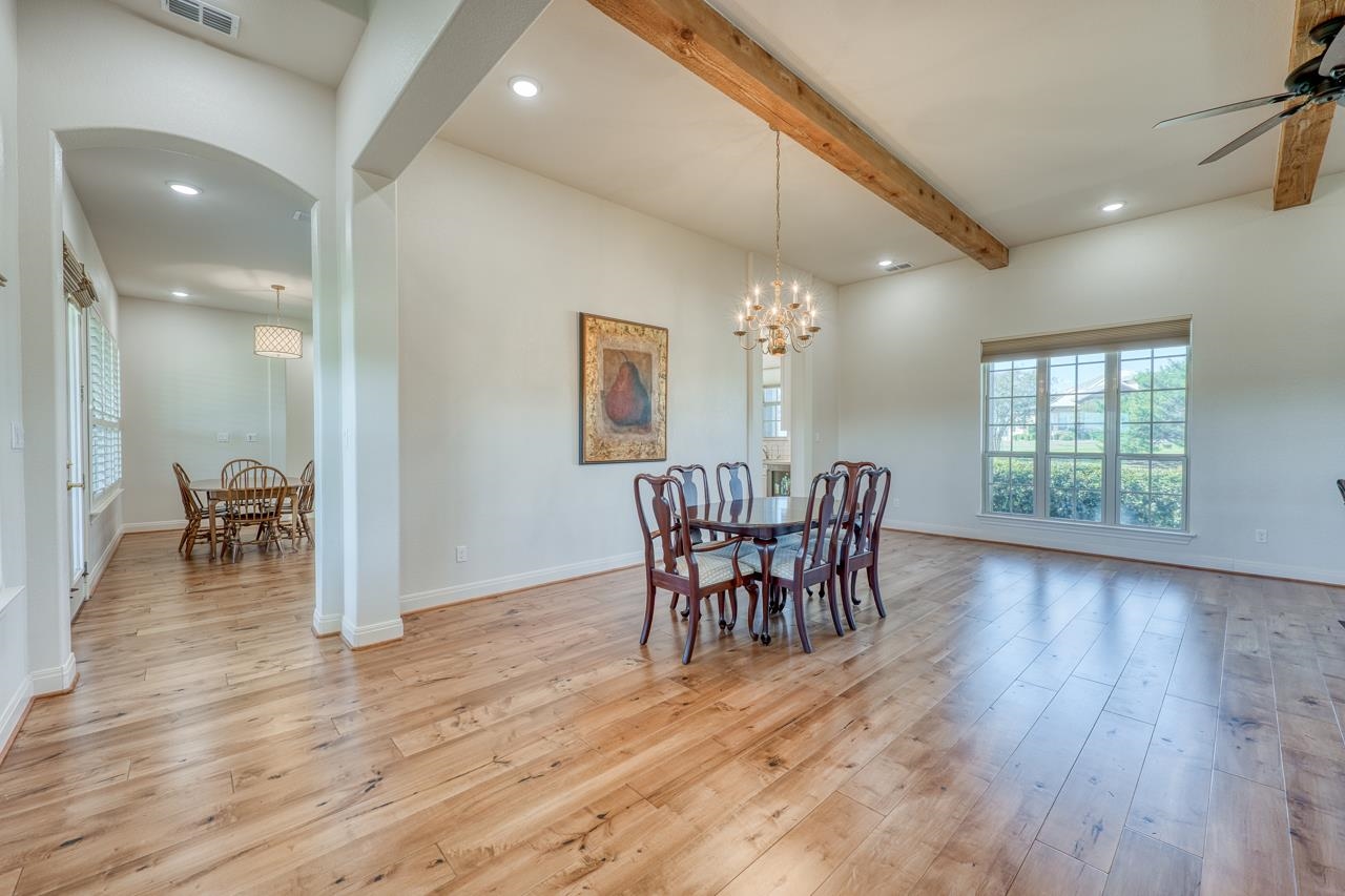 229 Eagle Ridge Burnet, TX 78611 - Photo 9 of 30 a dining room with furniture and wooden floor
