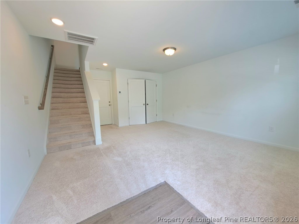 1939 Robin Hill Lane Raleigh, NC 27610 - Photo 3 of 25 an empty room with a stairs
