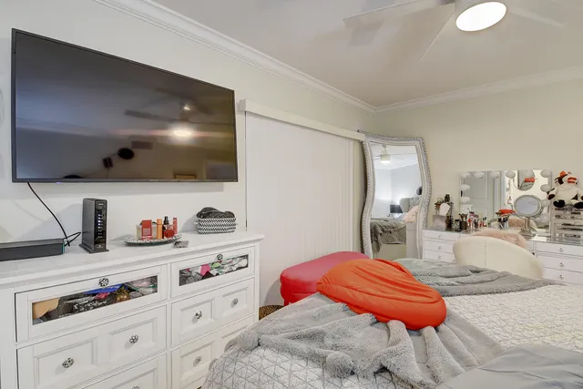 a bathroom with a toilet a sink and a mirror