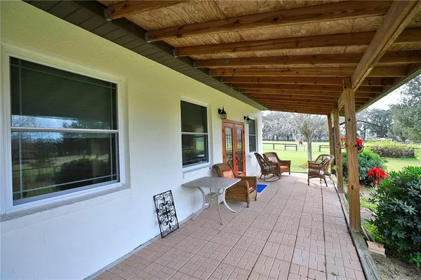 a view of a hallway with windows