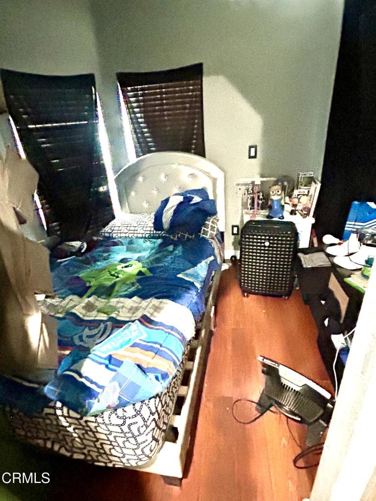 2400 East Pleasant Valley Road, Unit 108 Oxnard, CA 93033 - Photo 16 of 19 a living room with furniture and a rug