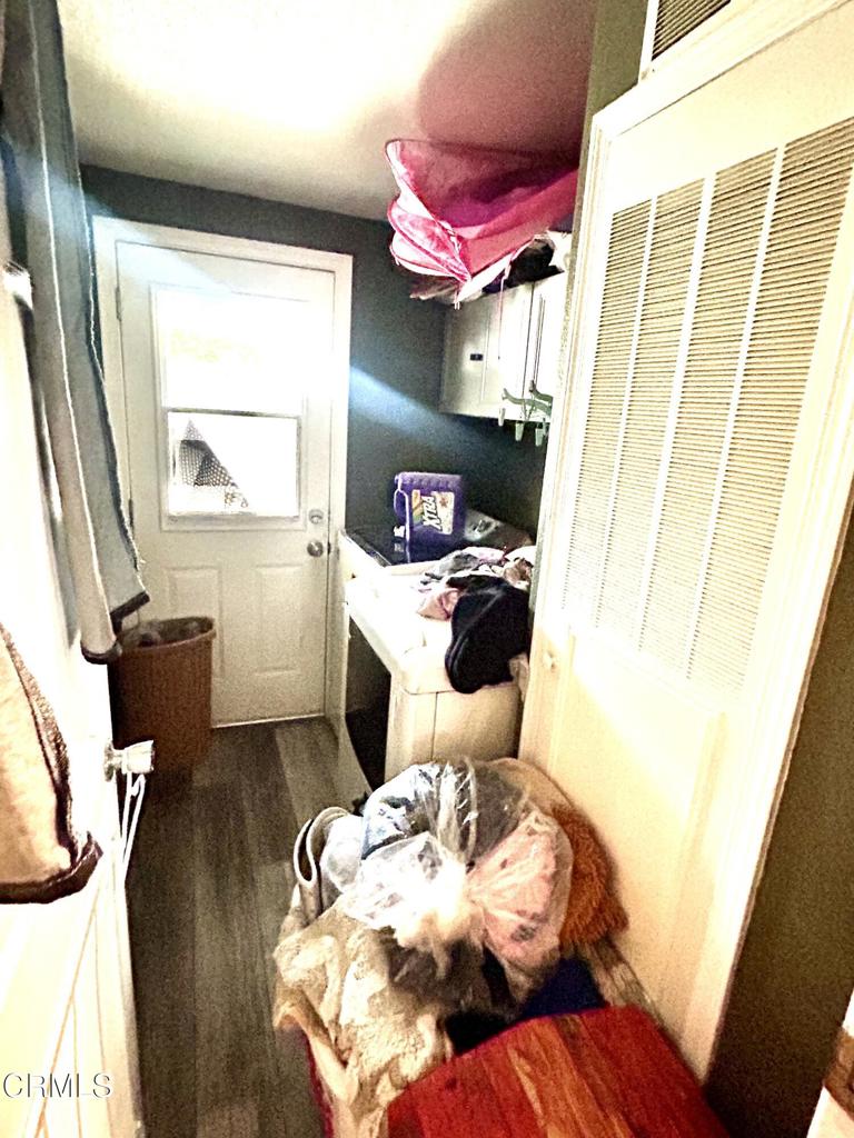 2400 East Pleasant Valley Road, Unit 108 Oxnard, CA 93033 - Photo 17 of 19 a bed room with a bed and a window