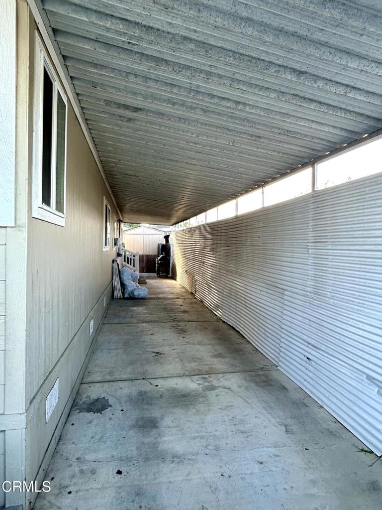 2400 East Pleasant Valley Road, Unit 108 Oxnard, CA 93033 - Photo 19 of 19 a view of a backyard of a house