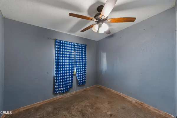 a bedroom with a bed and a cabinets