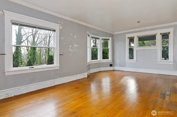 an empty room with windows