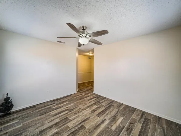 a view of a big room with wooden floor
