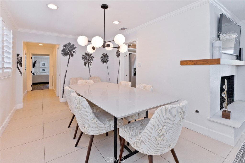 1057 East Marshall Way Palm Springs, CA 92262 - Photo 13 of 64 a view of a dining room and a table chair