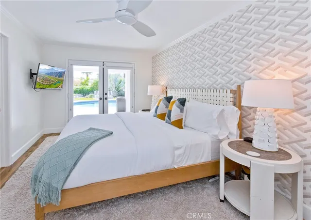 a bathroom with a shower sink vanity and mirror