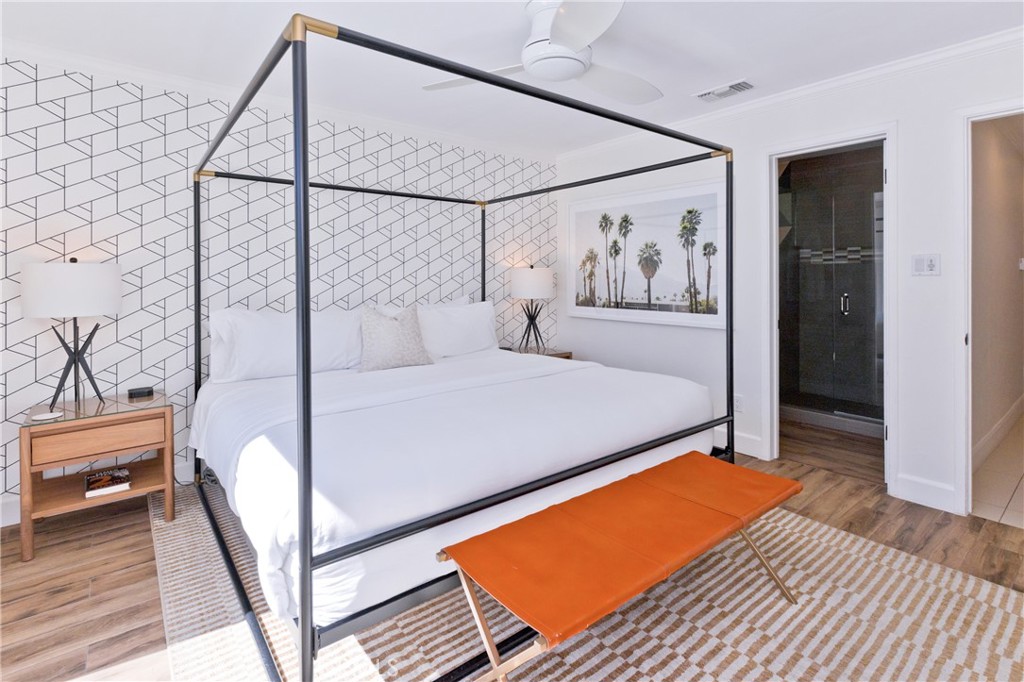 1057 East Marshall Way Palm Springs, CA 92262 - Photo 55 of 64 a bedroom with a bed and a painting on the wall