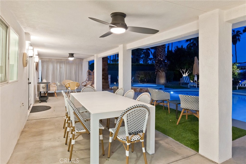 1057 East Marshall Way Palm Springs, CA 92262 - Photo 58 of 64 a view of a dining room with furniture window and outside view