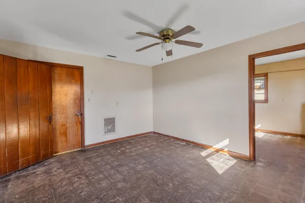 a view of a big room with carpet