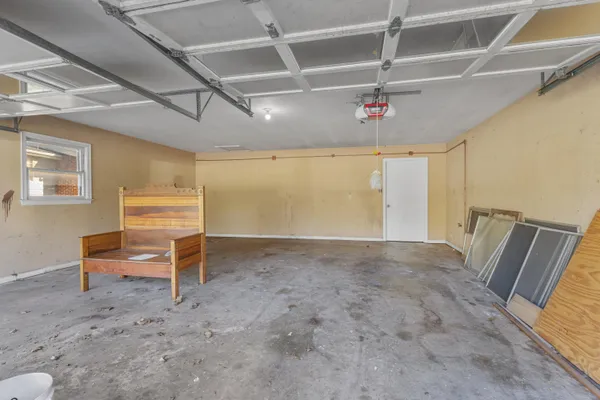a bathroom with a bathtub and a sink