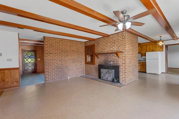 a view of a livingroom with a fireplace