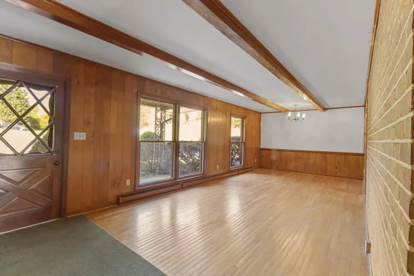 a view of an empty room and window