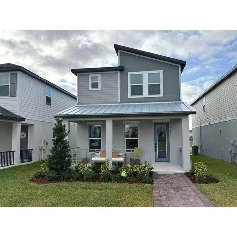 a black and white photo of a house