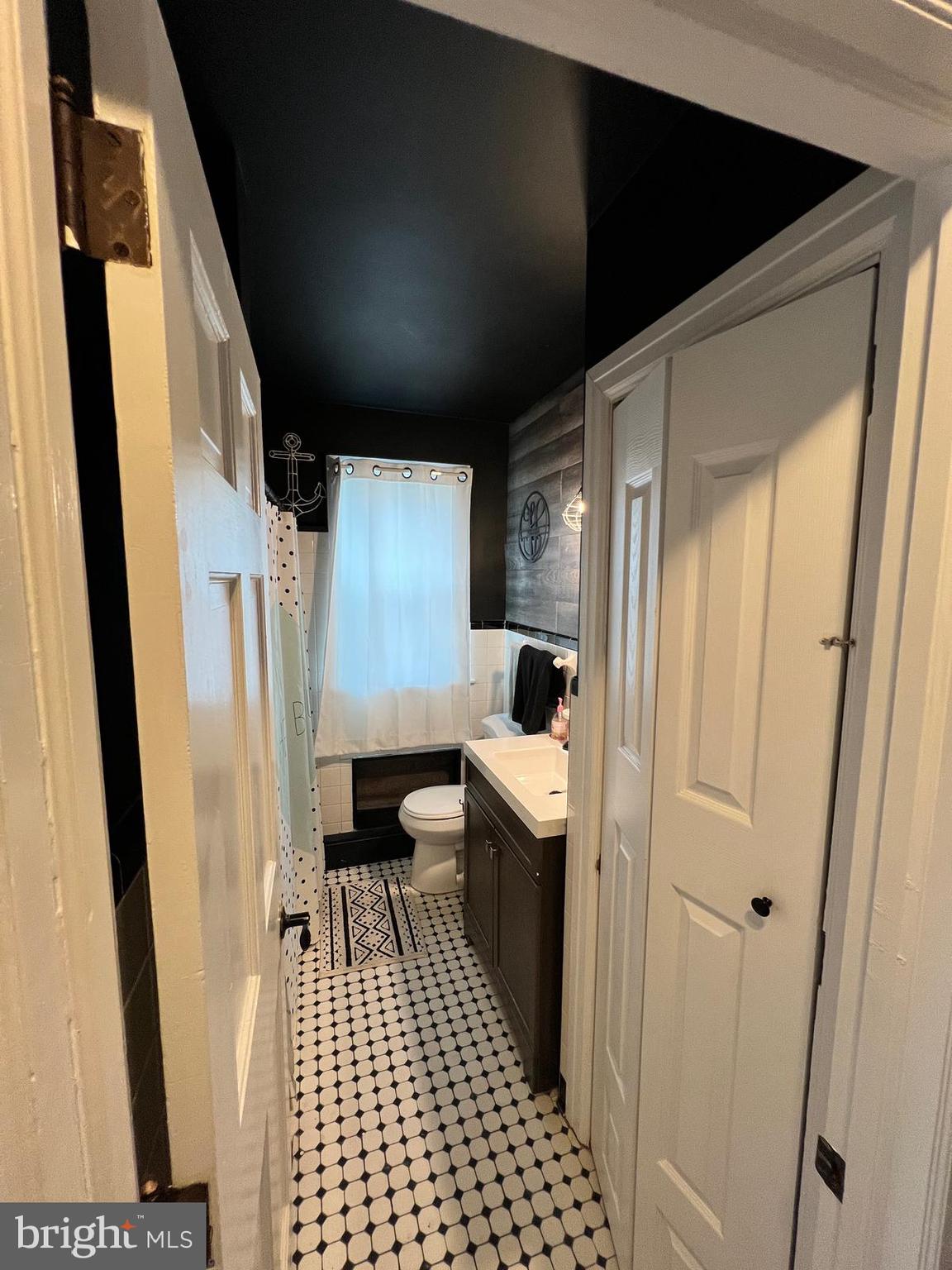 114 Hall Highway Crisfield, MD 21817 - Photo 17 of 30 a bathroom with a sink and a shower