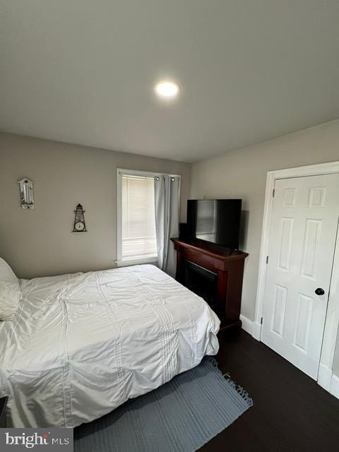 114 Hall Highway Crisfield, MD 21817 - Photo 20 of 30 a bedroom with a bed and a television
